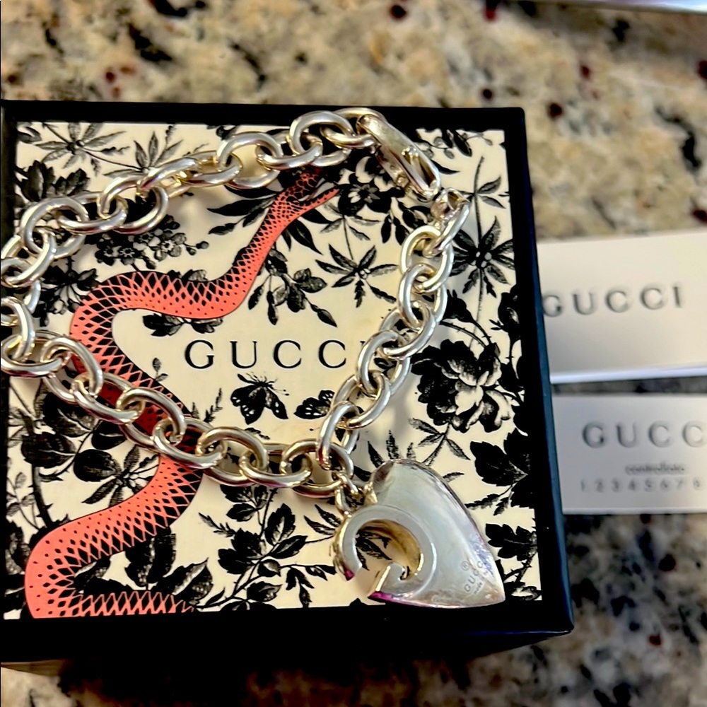 Gucci silver bracelet, box and all! Worn a few times.